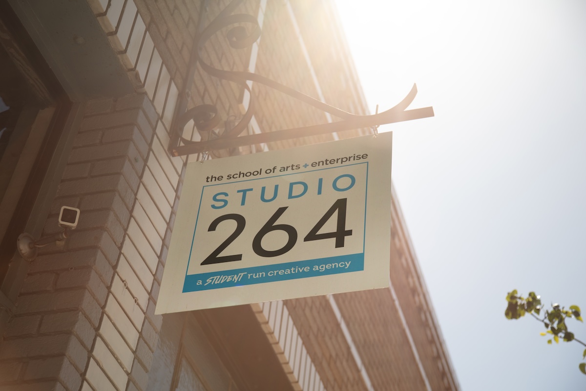 exterior signage of 264 backlit by the sun