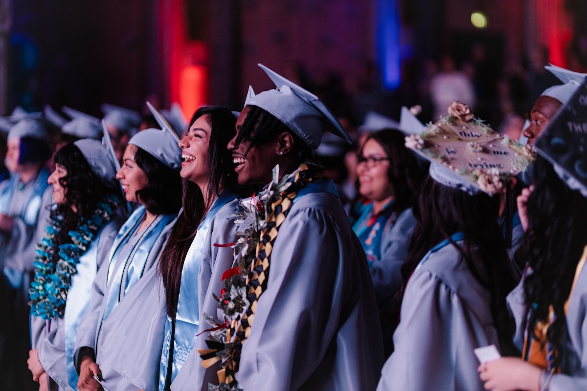 students in caps and gowns at The School of Arts and Enterprise graduation ceremony